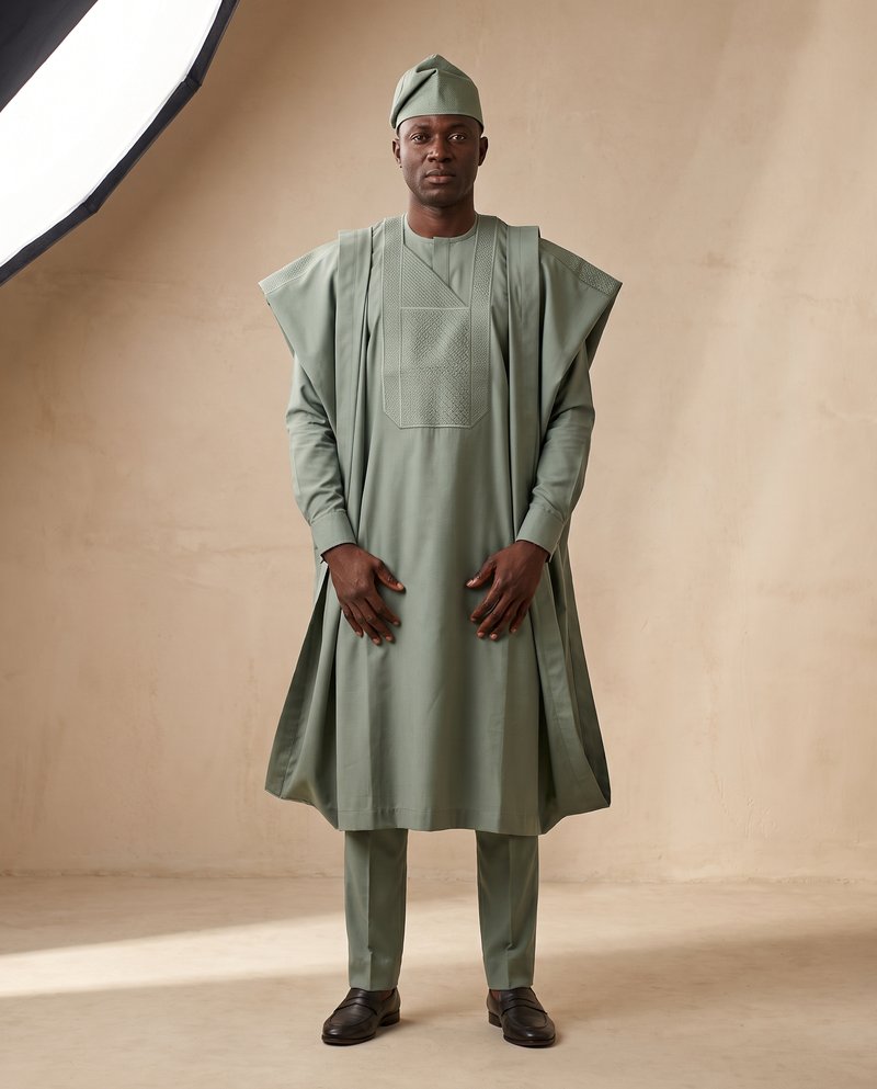 Sage agbada with embroidered detailing and matching fila